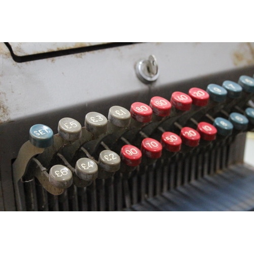 738 - An antique Gross cash register with key.