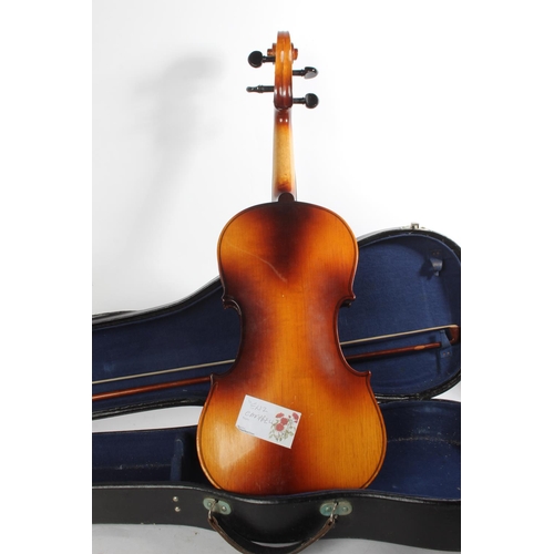 748 - A cased 'Blessing' violin.