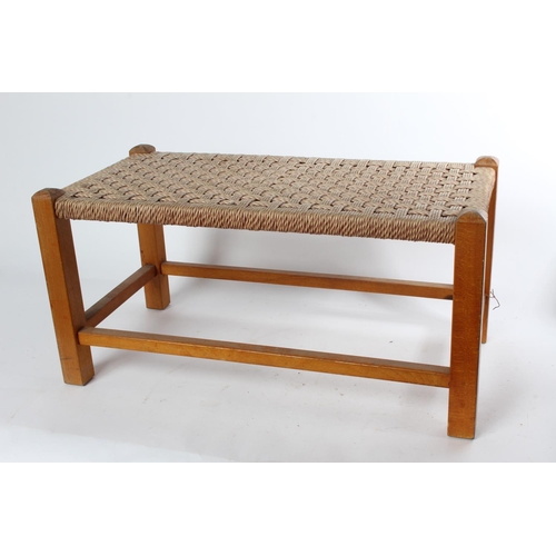 749 - A vintage weaved top long stool.