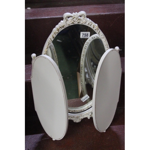 758 - A vintage style triple dressing table mirror with gilt detail.