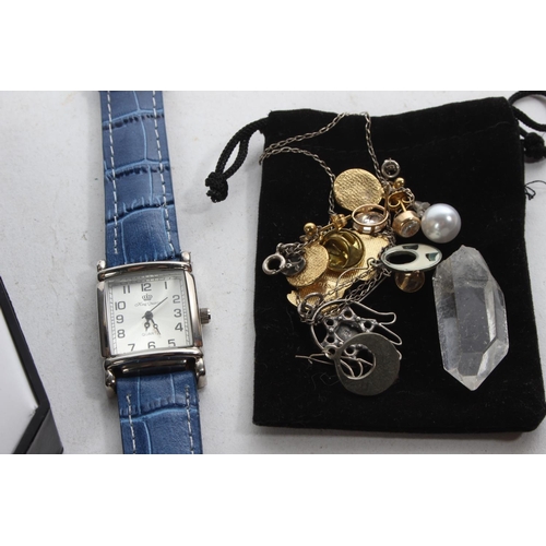 765 - A King Quartz ladies wrist watch, another and a selection of jewellery, badges and more.