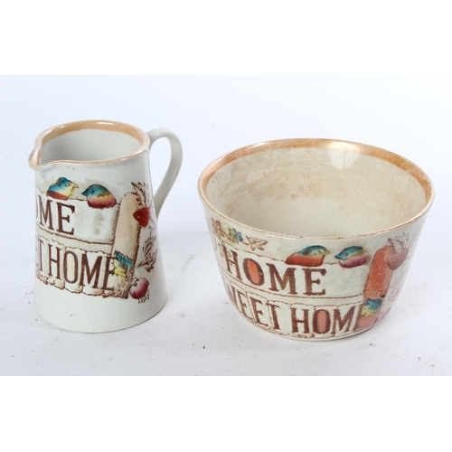 773 - An antique 'Home Sweet Home' ceramic jug and bowl.