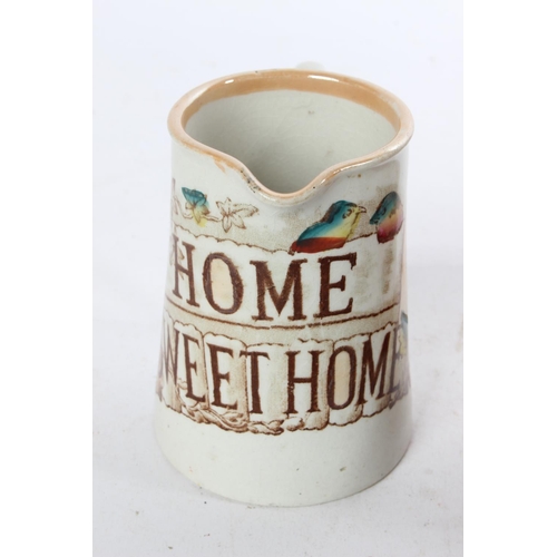 773 - An antique 'Home Sweet Home' ceramic jug and bowl.