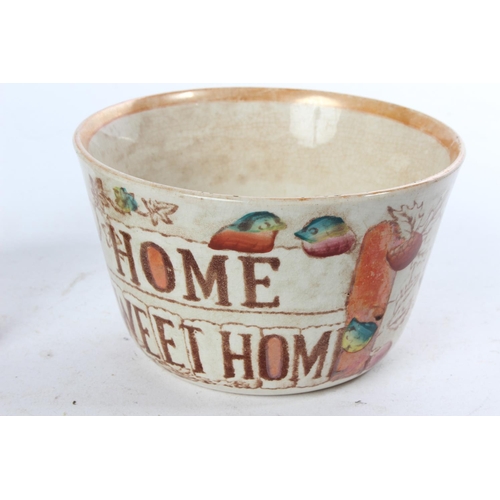 773 - An antique 'Home Sweet Home' ceramic jug and bowl.