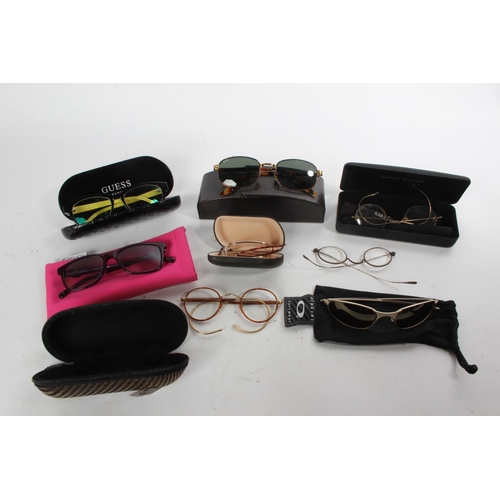 779 - Two antique pairs of glasses and more.