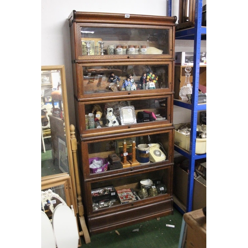 794 - A stunning antique oak five section Barrister bookcase, with glass front, up and over doors, measuri... 