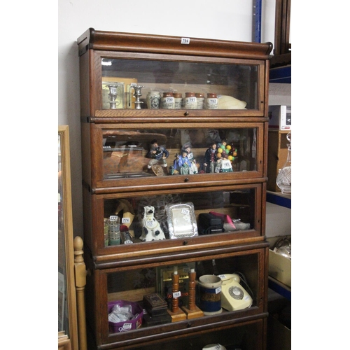 794 - A stunning antique oak five section Barrister bookcase, with glass front, up and over doors, measuri... 