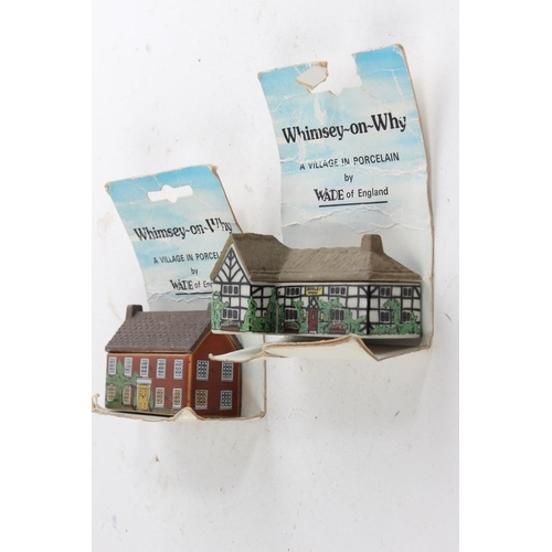 637 - Two Wade 'Whimsey-on-Why' porcelain houses.