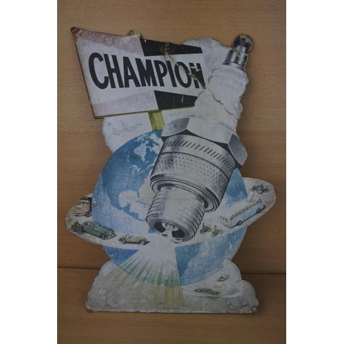 802 - A vintage cardboard shop display, advertising Champion Spark Plugs.