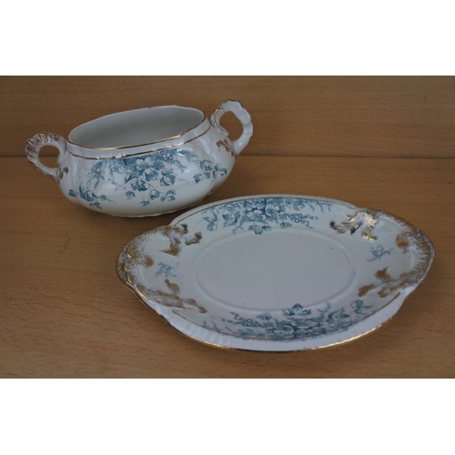 815 - An antique two handled sauce bowl and plate.