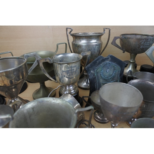 820 - A large lot of silver plated presentation cups.