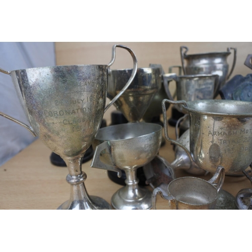 820 - A large lot of silver plated presentation cups.