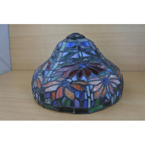 832 - A vintage leaded Tiffany style glass lamp shade, measuring 12