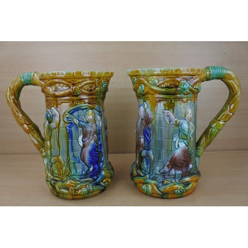 833 - A stunning pair of glazed pottery jugs.