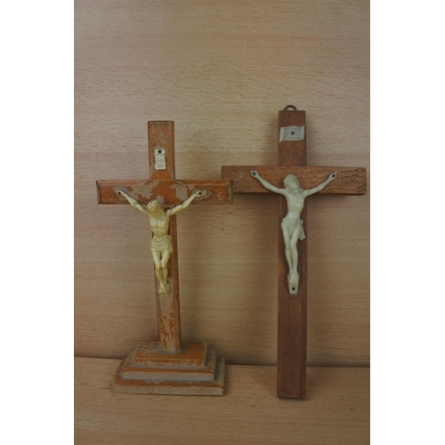 837 - A wooden crucifix wall plaque and another.