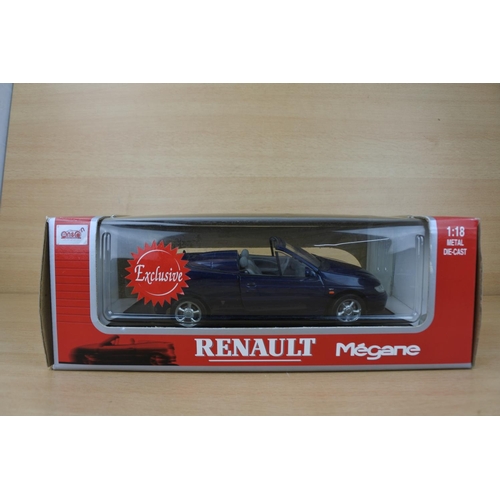 844 - A boxed Anson Renault Megane toy car, scale 1:18.