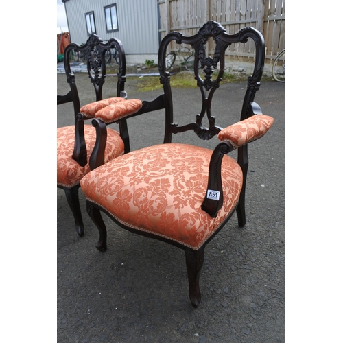 851 - A stunning pair of Antique/ Victorian Ebony upholstered armchairs.