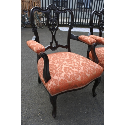 851 - A stunning pair of Antique/ Victorian Ebony upholstered armchairs.