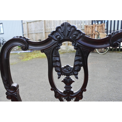 851 - A stunning pair of Antique/ Victorian Ebony upholstered armchairs.