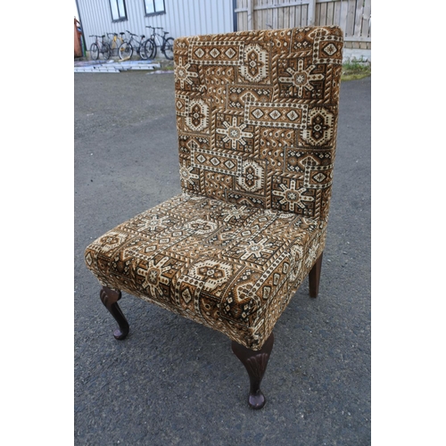 854 - A vintage upholstered nursing chair.