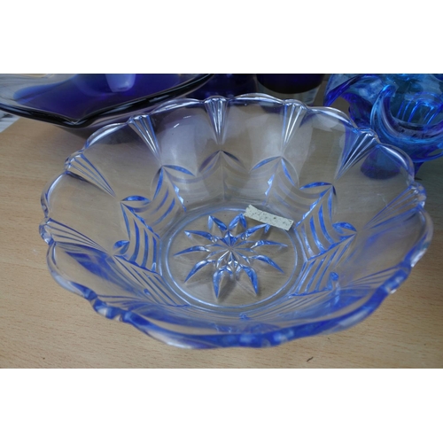 862 - A large collection of vintage blue glass ware.