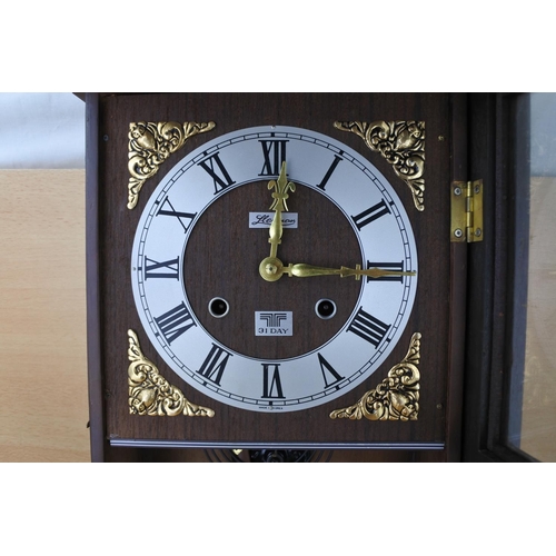 864 - A 31 day wall clock.