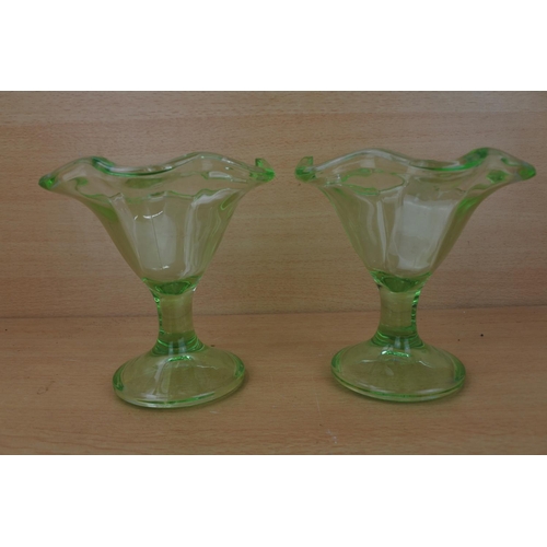 869 - A pair of vintage green glass sundae dishes.