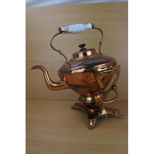 872 - A stunning antique copper spirit kettle.