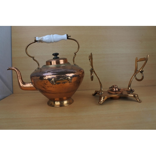 872 - A stunning antique copper spirit kettle.