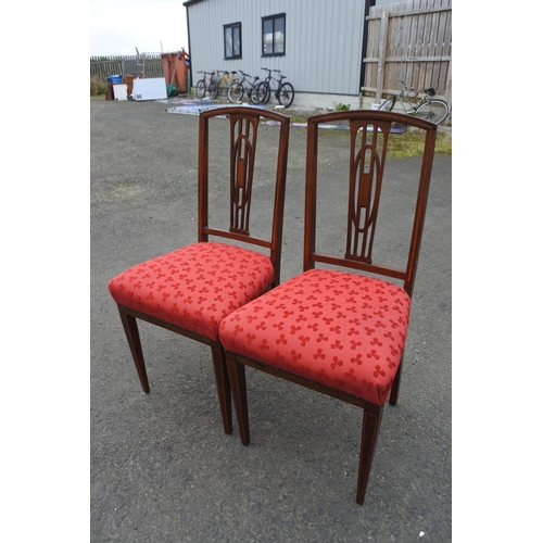 877 - A pair of antique mahogany and inlay chairs.