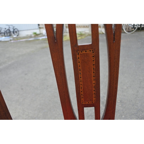 877 - A pair of antique mahogany and inlay chairs.