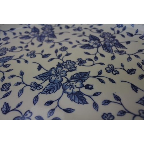 878 - Two antique rectangular dishes (a/f) and two oval blue and white floral patterned plates.