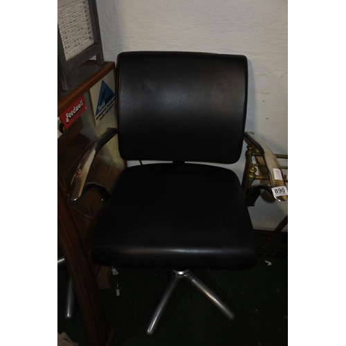 890 - A metal framed swivel chair.