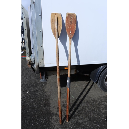 893 - A pair of vintage wooden oars.