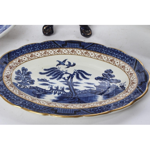 904 - A set of three antique Mintons platters, an antique Dresden sauceboat with scroll detail and more.