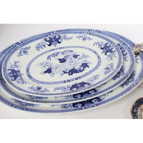 904 - A set of three antique Mintons platters, an antique Dresden sauceboat with scroll detail and more.