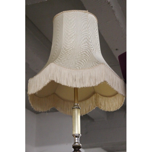 927 - A vintage standard lamp/table.