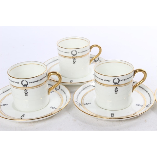 929 - A set of six Aynsley coffee cups and saucers.