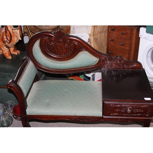 944 - An upholstered telephone table with drawer.