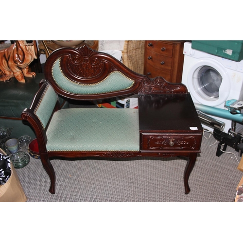 944 - An upholstered telephone table with drawer.