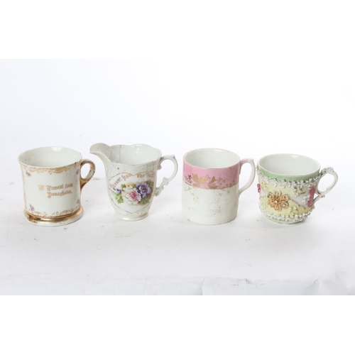 956 - A collection of 3 antique souvenir cups, along with similar jug.