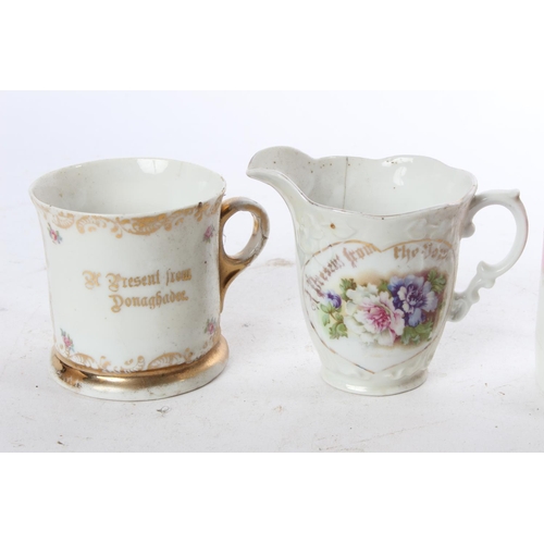 956 - A collection of 3 antique souvenir cups, along with similar jug.