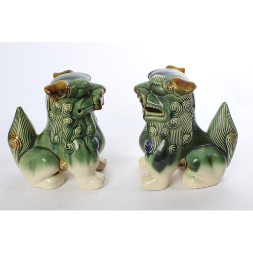 968 - A stunning pair of large ceramic 'Foo Dogs' (1 a/f)