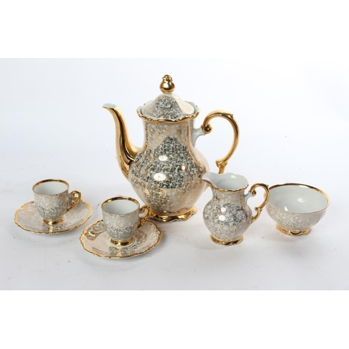 981 - A decorative vintage coffee set.