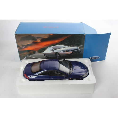 986 - A boxed Ford Cougar model, by Action.