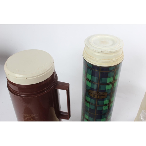 999 - A collection of vintage thermos flasks & more.