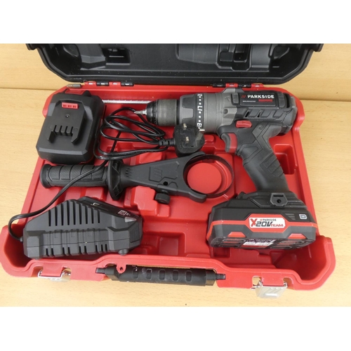 1004 - A cased Parkside cordless drill set.