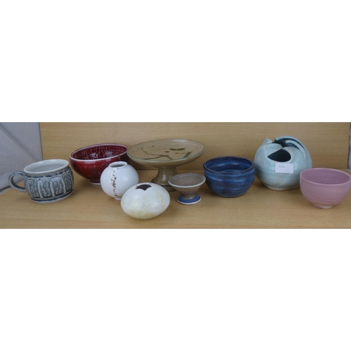 1016 - A collection of various Studio Pottery ceramics.