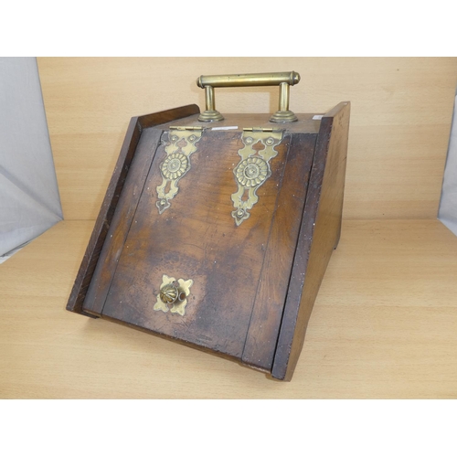 1022 - An antique oak coal box with brass hardware.