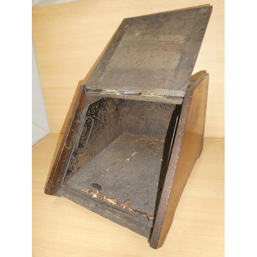 1022 - An antique oak coal box with brass hardware.